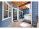 Inviting front door and porch with blue accents and wood flooring at 2209 Sumner Green Ave # M, Charlotte, NC 28203