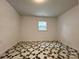 A spacious, light-filled bedroom enhanced by a decorative carpet and a window at 2328 Milton Ave, Gastonia, NC 28052