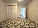 Bedroom featuring unique carpeting and a glimpse into the hallway from inside at 2328 Milton Ave, Gastonia, NC 28052