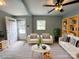 Bright, staged living room with modern decor, a striped rug, and comfortable seating arrangement at 2328 Milton Ave, Gastonia, NC 28052