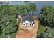 New construction features stunning views, with surrounding trees, and sits directly next to the lake at 242 Shoreline Loop, Mooresville, NC 28117