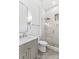 Modern bathroom featuring glass shower, updated vanity, stylish fixtures and a sleek design at 242 Shoreline Loop, Mooresville, NC 28117