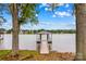Private dock with a covered area, perfect for enjoying waterfront views at 242 Shoreline Loop, Mooresville, NC 28117