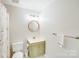 Neutral bathroom featuring a sink with storage and neutral paint at 2635 Cotton Planter Ln, Charlotte, NC 28270
