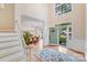 Welcoming foyer with hardwood floors, high ceilings, and views of the dining area and front yard at 2635 Cotton Planter Ln, Charlotte, NC 28270