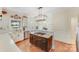 Spacious kitchen with stainless steel appliances, hardwood floors, and custom lighting at 2635 Cotton Planter Ln, Charlotte, NC 28270