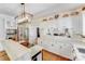 Gourmet kitchen with stainless steel appliances and sleek white cabinetry at 2635 Cotton Planter Ln, Charlotte, NC 28270