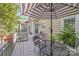 Outdoor patio featuring patio furniture, a grill and wood railing at 2635 Cotton Planter Ln, Charlotte, NC 28270