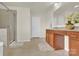 A luxurious primary bath with glass enclosed shower and double vanity with granite countertops at 282 Fischer Rd, Fort Mill, SC 29175