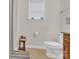 Cozy bathroom featuring tile floors, a toilet, and natural light at 282 Fischer Rd, Fort Mill, SC 29175