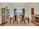 Elegant dining room with stylish furniture, chandelier, and large window providing natural light at 282 Fischer Rd, Fort Mill, SC 29175