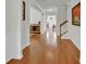 Inviting foyer with hardwood floors, white wainscoting, and staircase leading to the upper level at 282 Fischer Rd, Fort Mill, SC 29175