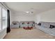 Large living room features a projector and a wall of gray upholstered seating at 282 Fischer Rd, Fort Mill, SC 29175