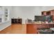 Well-lit office space with hardwood floors and built-in shelving at 282 Fischer Rd, Fort Mill, SC 29175