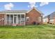 This home includes a screened porch, seamlessly blending indoor and outdoor living at 2910 Lake James Ct, Monroe, NC 28110