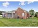 This home includes a screened porch, seamlessly blending indoor and outdoor living spaces at 2910 Lake James Ct, Monroe, NC 28110