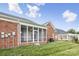 This home includes a screened porch, seamlessly blending indoor and outdoor living spaces at 2910 Lake James Ct, Monroe, NC 28110