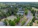 Aerial view of community tennis courts and bocce ball courts with landscaping at 3043 Santee Ct, Fort Mill, SC 29707
