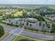 Aerial view of community clubhouse, golf course and surrounding greenery at 3043 Santee Ct, Fort Mill, SC 29707