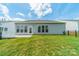 Fenced backyard with a concrete patio and well-maintained lawn offers privacy and space at 3043 Santee Ct, Fort Mill, SC 29707