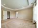 Bedroom featuring carpet floors, tray ceilings, and lots of natural light at 3043 Santee Ct, Fort Mill, SC 29707
