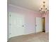 Bedroom with lavender walls, carpet, and white doors at 3043 Santee Ct, Fort Mill, SC 29707