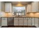 Kitchen featuring stainless steel appliances, granite countertops, and white cabinets at 3043 Santee Ct, Fort Mill, SC 29707