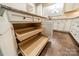 Kitchen cabinetry with pull-out drawers and granite countertops offer ample storage at 3043 Santee Ct, Fort Mill, SC 29707
