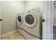 Laundry room featuring a white washer and dryer at 3043 Santee Ct, Fort Mill, SC 29707