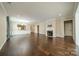 Spacious living room featuring a fireplace, hardwood floors, and elegant trim at 3043 Santee Ct, Fort Mill, SC 29707