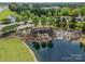 Aerial view of the Sun City Carolina Lakes entrance sign and surrounding landscape at 3043 Santee Ct, Fort Mill, SC 29707