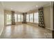 Bright sun room with large windows, tile flooring, and access to the outdoors at 3043 Santee Ct, Fort Mill, SC 29707