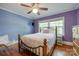 Cozy bedroom with hardwood floors, natural light, and decorative chair at 308 Gillsbrook Rd, Lancaster, SC 29720