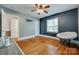 Bright bedroom with hardwood floors, a chair, and a window for natural light at 308 Gillsbrook Rd, Lancaster, SC 29720