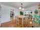 Open dining room with hardwood floors and bright white walls, blending classic elegance at 308 Gillsbrook Rd, Lancaster, SC 29720