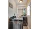 Efficient laundry room with modern washer and dryer, and built-in shelving at 308 Gillsbrook Rd, Lancaster, SC 29720