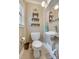 Charming powder room featuring a modern sink, and decorative shelves at 308 Gillsbrook Rd, Lancaster, SC 29720