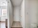 Bright entryway with neutral tones, tile flooring, and white doors and trim at 3109 Heathstead Pl, Charlotte, NC 28210