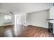 Bright living space with hardwood floors, fireplace, and lots of natural light at 3109 Heathstead Pl, Charlotte, NC 28210