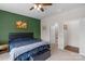 Well-appointed bedroom with an ensuite bathroom and a walk-in closet at 4040 Deep River Way, Waxhaw, NC 28173