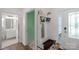 Hallway featuring coat rack and view of the bathroom at 4040 Deep River Way, Waxhaw, NC 28173