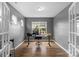 Bright home office with a large window, desk, and ample natural light at 4040 Deep River Way, Waxhaw, NC 28173