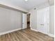 Spacious bedroom with hardwood floors, and a view of other rooms, creating a welcoming atmosphere at 4625 Piedmont Row Dr # 410, Charlotte, NC 28210