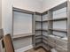 Well-organized closet with shelving and hanging rods, providing ample storage space at 4625 Piedmont Row Dr # 410, Charlotte, NC 28210