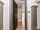 An inviting entryway featuring a door, and view of the bright and airy living space at 4625 Piedmont Row Dr # 410, Charlotte, NC 28210