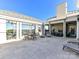 Spacious outdoor terrace with multiple seating areas, perfect for entertaining and relaxation at 4625 Piedmont Row Dr # 410, Charlotte, NC 28210