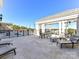 Beautiful rooftop deck featuring lounge seating, tables, and open views for relaxation and entertainment at 4625 Piedmont Row Dr # 410, Charlotte, NC 28210