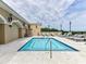 Refreshing swimming pool surrounded by lounge chairs and well-maintained outdoor area at 4625 Piedmont Row Dr # 410, Charlotte, NC 28210