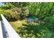 Aerial view of the backyard featuring a lush lawn and above-ground pool at 4700 Hickory Grove Rd, Mount Holly, NC 28120