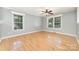 Bedroom with hardwood floors, neutral paint, and lots of natural light at 4700 Hickory Grove Rd, Mount Holly, NC 28120